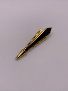 Vintage Monet gold tone black enamel brooch